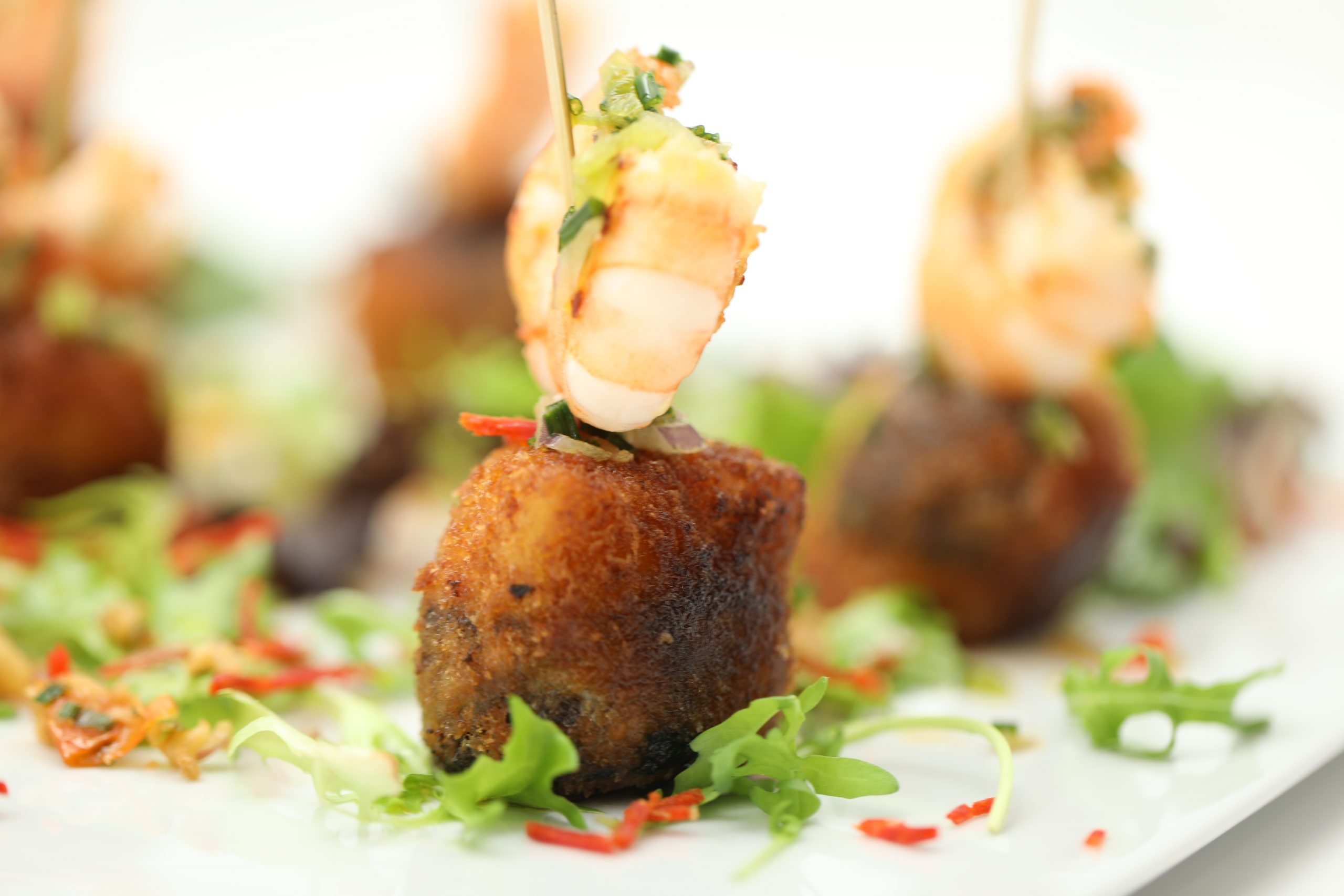 Boudin noir et gambas en salade de pomme de terre